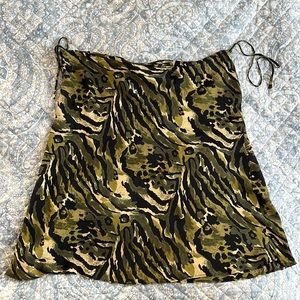 100% rayon animal print black and green knee- long A-line skirt. Size M